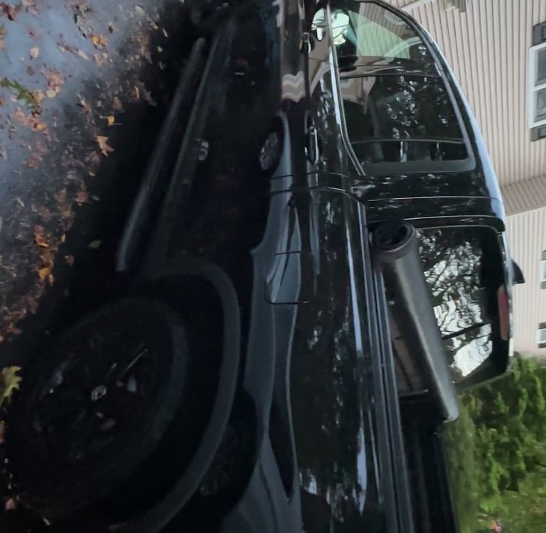 professionally detailed truck in ct, car is glossy and reflects another car