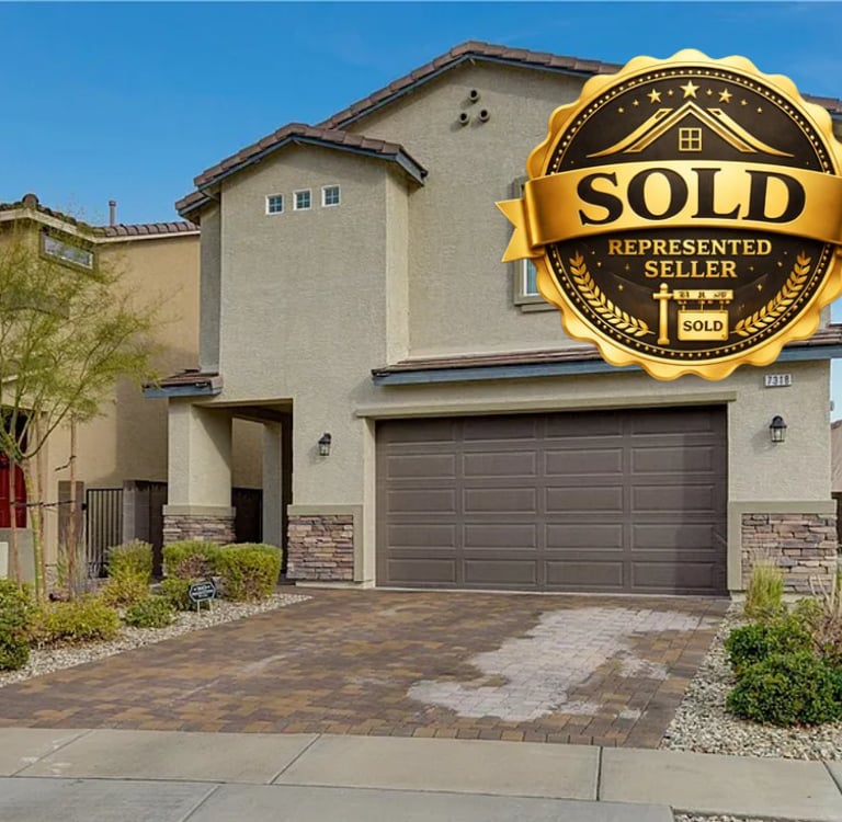 a home with a sold sign on the front of a house