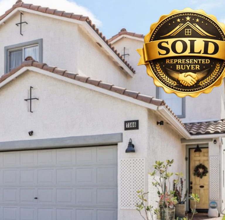 a house with a sold sign and a sold sign