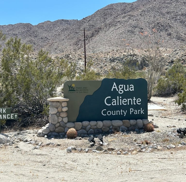 Sign posted at the entrance of Agua Caliente Park