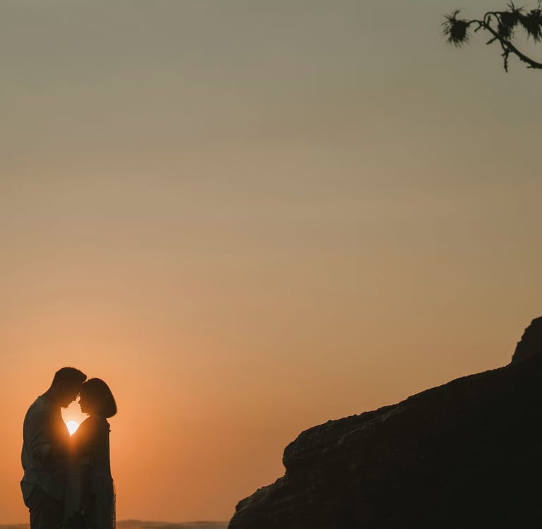 Sunset silhouette couple at Nyanyi Beach, Bali – timeless Bali photography