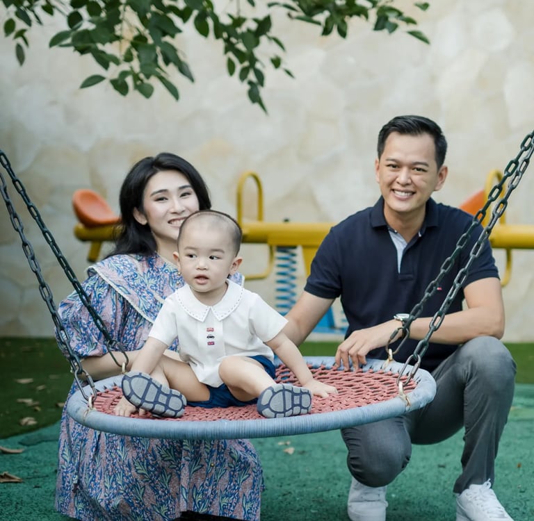 Family photography session at the children's playground of The Apurva Kempinski Bali in Nusa Dua