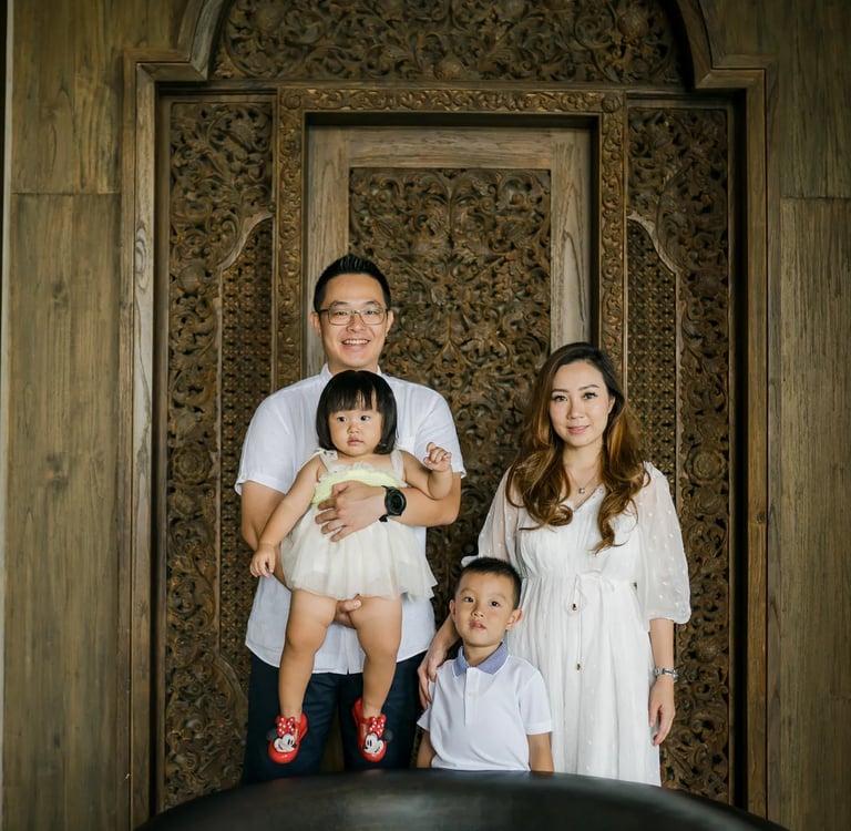 Family portrait inside The Grand Lobby at The Apurva Kempinski Bali, a luxury family photography location in Nusa Dua