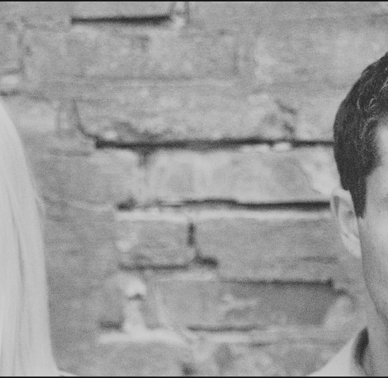 a man and woman standing next to each other