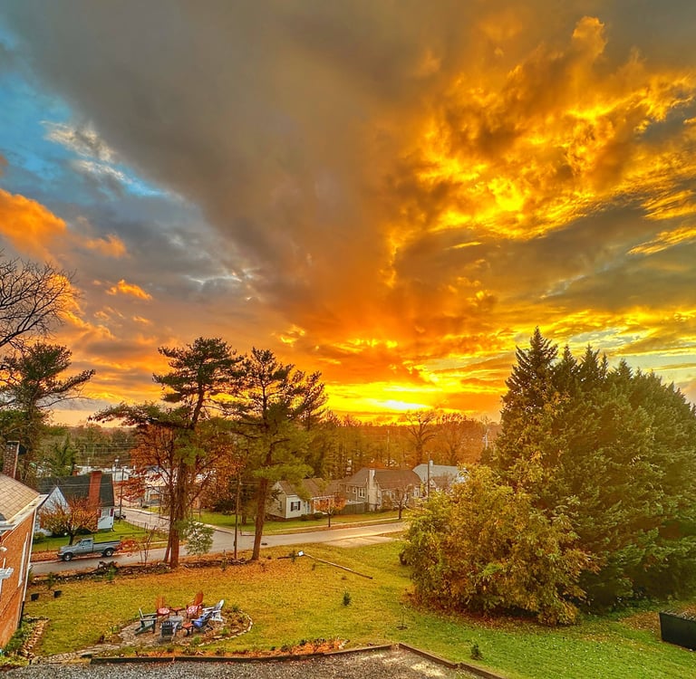 backyard sunset with carriage house and fire pit 2123 rivermont