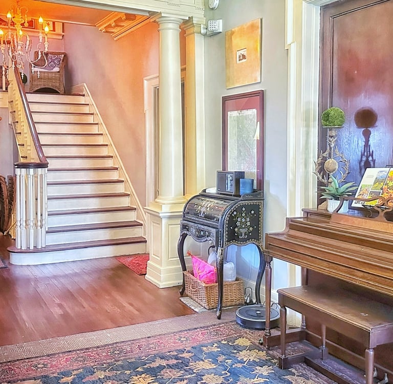 foyer and grand staircase 2123 rivermont apartments