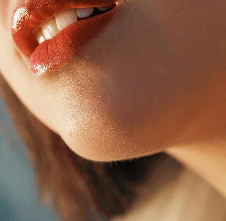 a woman with a lip product on her lips