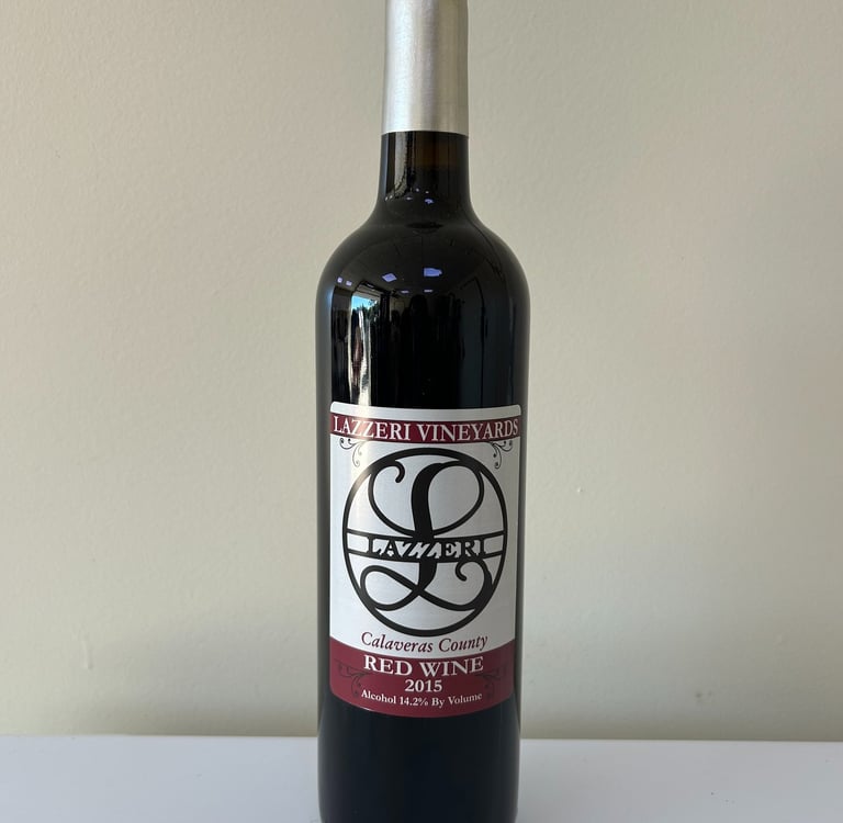 An unopened bottle of wine labeled 2015 Red Blend