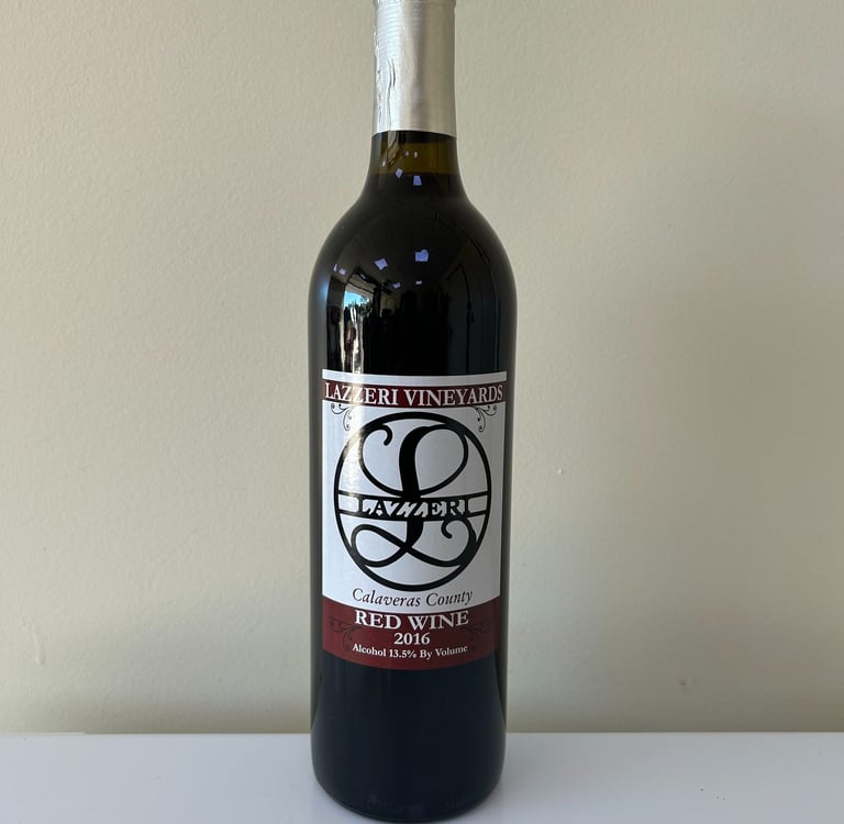An unopened bottle of wine labeled 2016 Red Blend