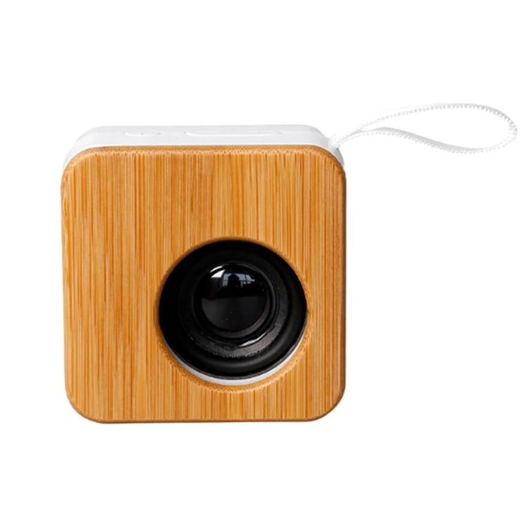 Portable square bluetooth speaker with a natural bamboo wood face and white carry strap.