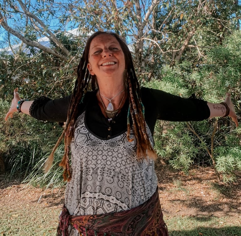 a happy woman with dreadlocks