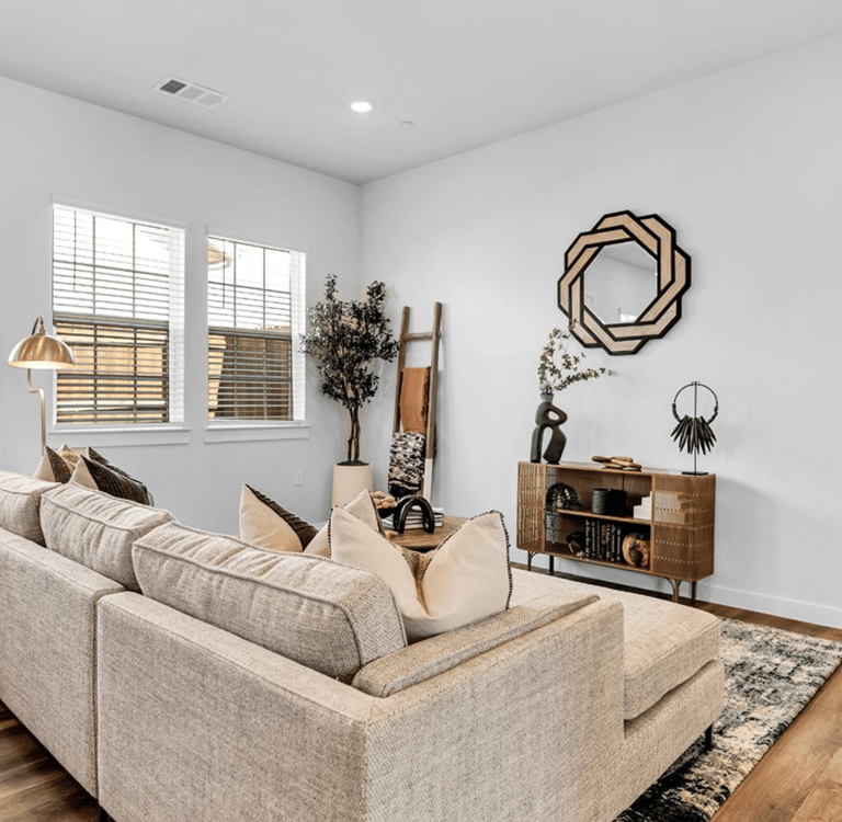 a living room with a couch and a television