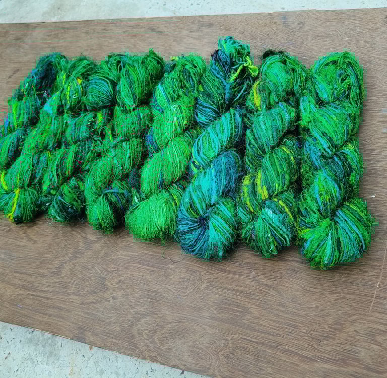 this is fine quality of recycled sari silk yarn. 125 meters of yarn in a 100 gram of skein. 