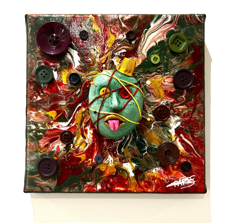 a painting of a face with buttons and buttons