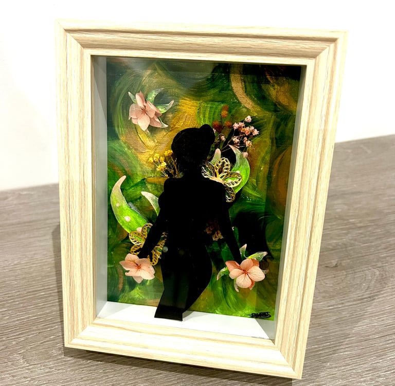 Ilona Paris painting, a shadow of a woman with flower