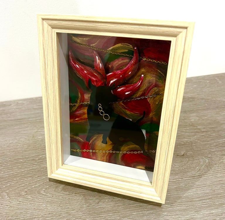 Ilona Paris painting, a picture of a picture of a bull with fire