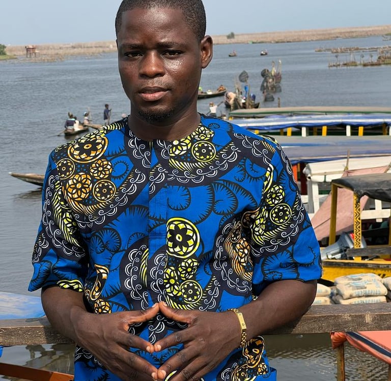 Dahomey African Tours Senior Guide and Tour Planner at Ganvie Stilt Village in Benin