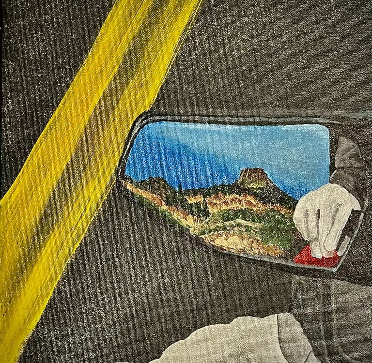 The rearview mirror on a motorcyle ride