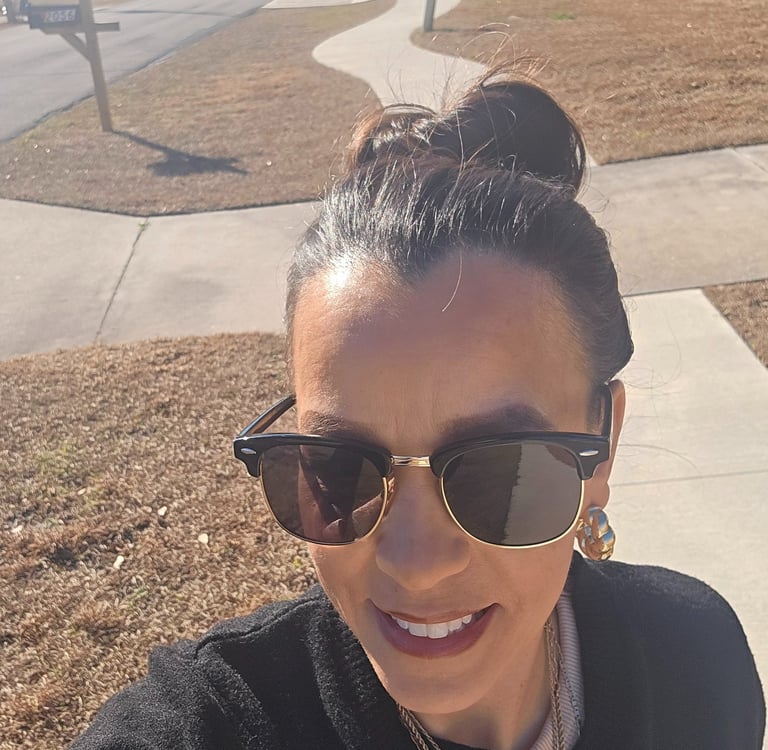 Lifestyle selfie during a sunny outdoor walk focused on confidence and calm