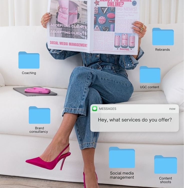 A social media manager sitting on a white couch holding a magazine with digital service folders overlay.
