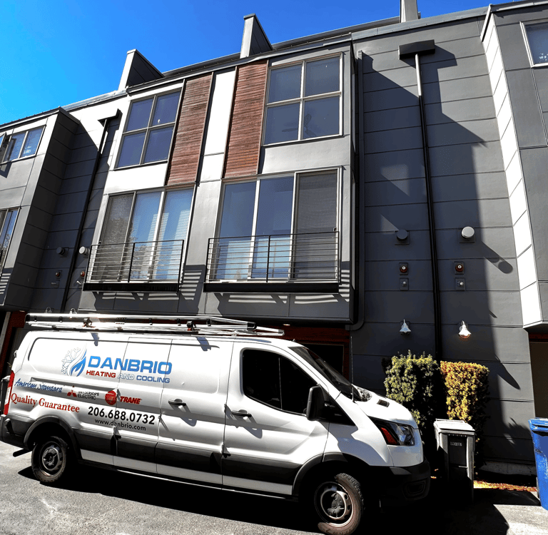 DANBRIO's Branded Van in front of a building visiting our client