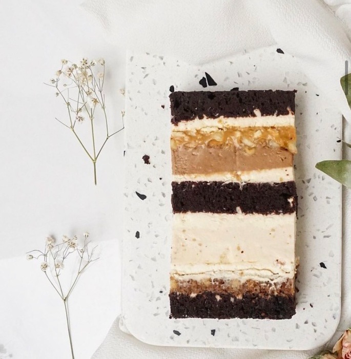 a piece of cake with a slice of cake on a plate