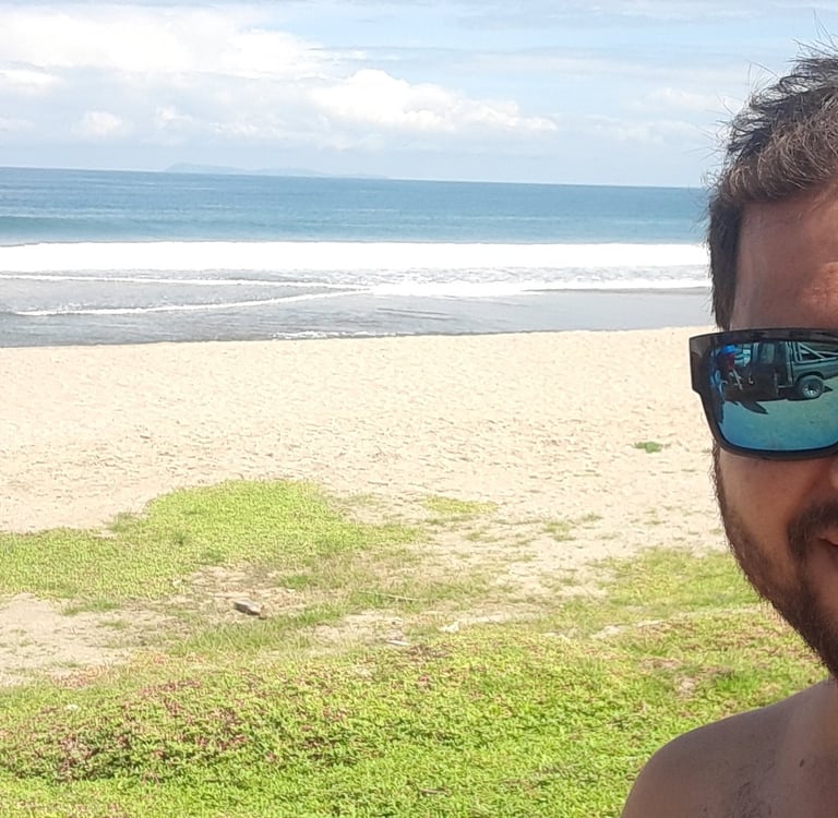 Jose Moreira surf guide on the beach