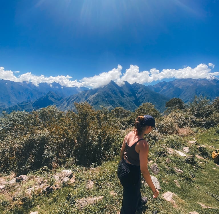 Girl walking Inca trail Llactapata