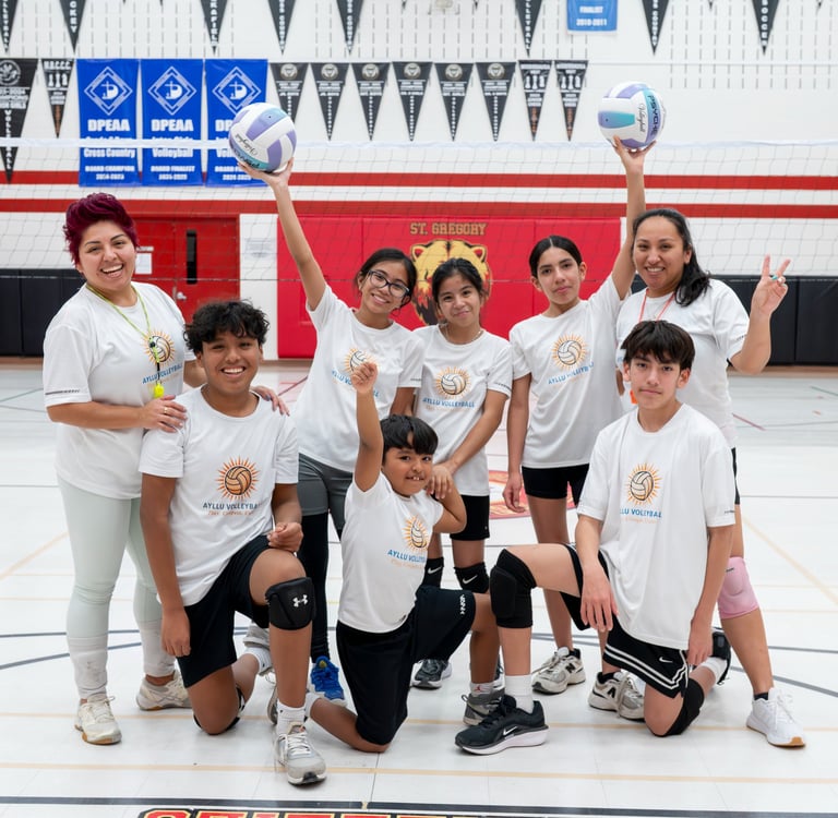 children participating in volleyball activities at outdoor summer camp
