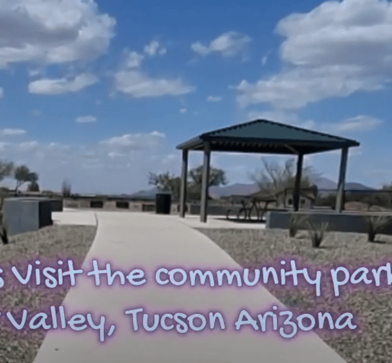 a walkway with a gazeboar and a gazeboar