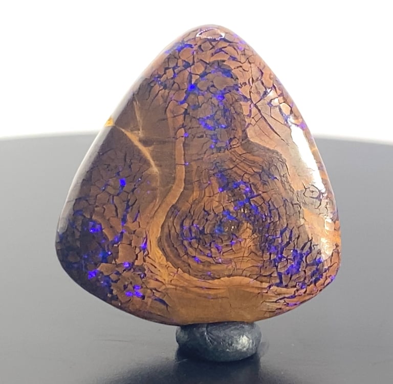 Purple flashes amongst Ironstone. Unique Queensland Boulder Opal from Australia.