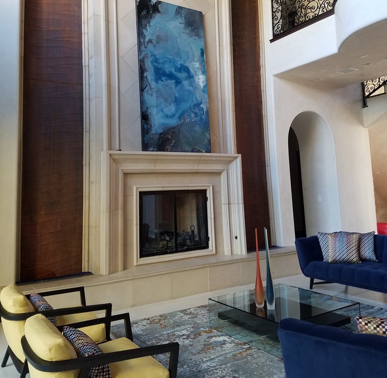 Art - Infinate Waters by Joline Renn and 8x4  resin piece -walls are venetian plaster in off white