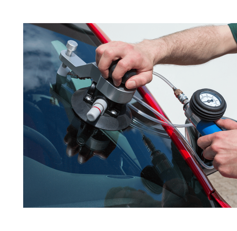 a man is holding a hose and a hose in his hand