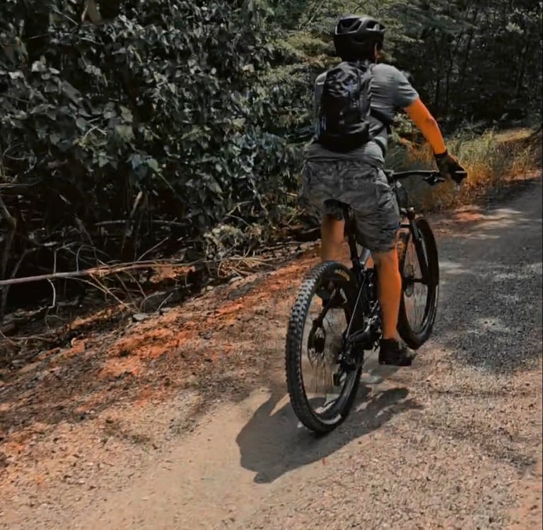 a man riding a eMTB down at Los Pozos