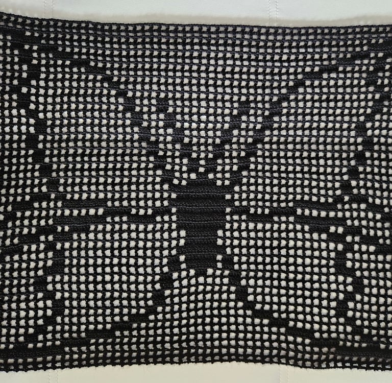 a filet crochet butterfly