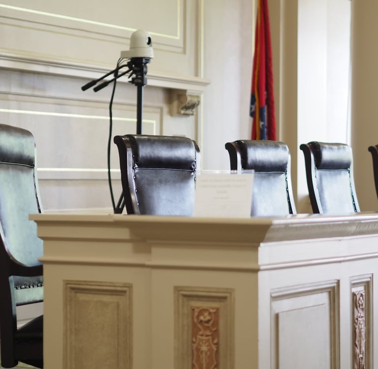 Arkansas Historic Supreme Court seats sit empty. This courthouse was established in 1836.