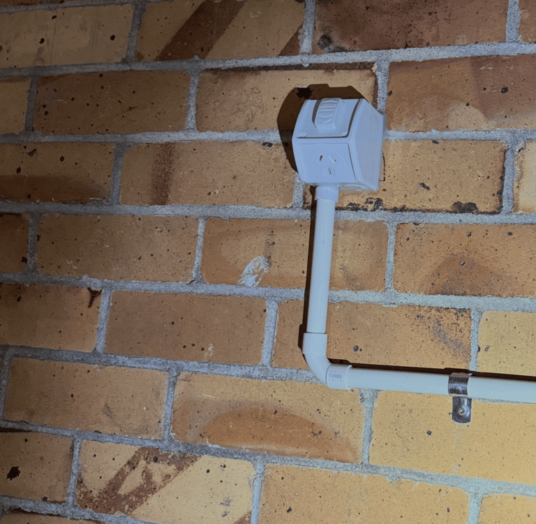 Weatherproof outdoor power point installed by licensed electrician