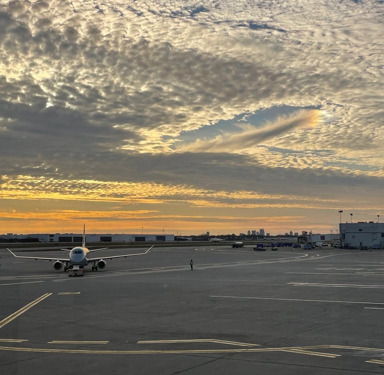 a plane is parked on the tarmac