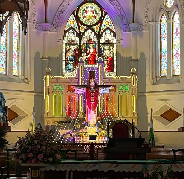 a church with a cross on the altar