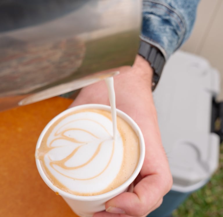 Latte art being poured