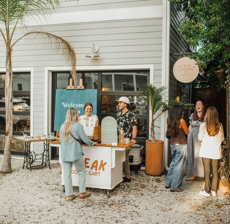 Guests enjoying the five star experience break coffee cart provides for a private event