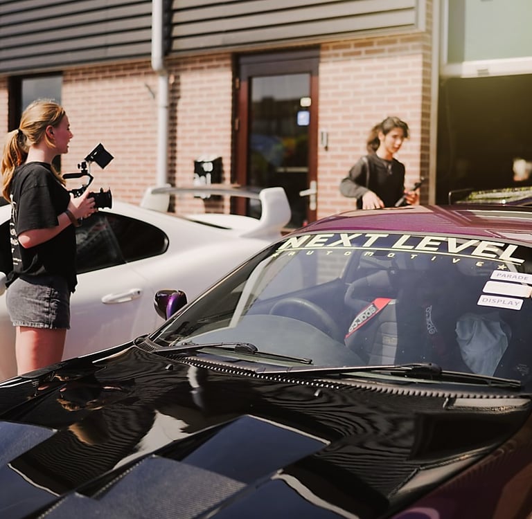 Teenage filmmakers discussing their next shot.