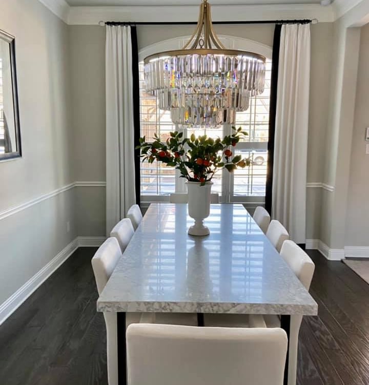 Custom French Pleated Drapery with Blalck accent band on leading edge.  Custom Black Hardware with acrylic finials Kasmir Fab