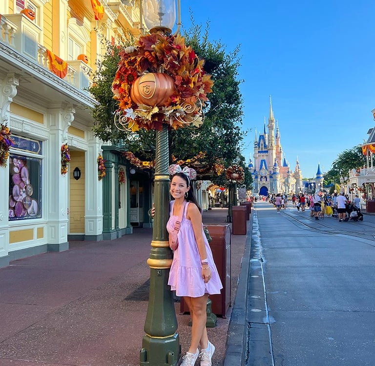 Jessica Henderson pictured on Main Street, U.S.A.® inside Disney's Magic Kingdom® Park.
