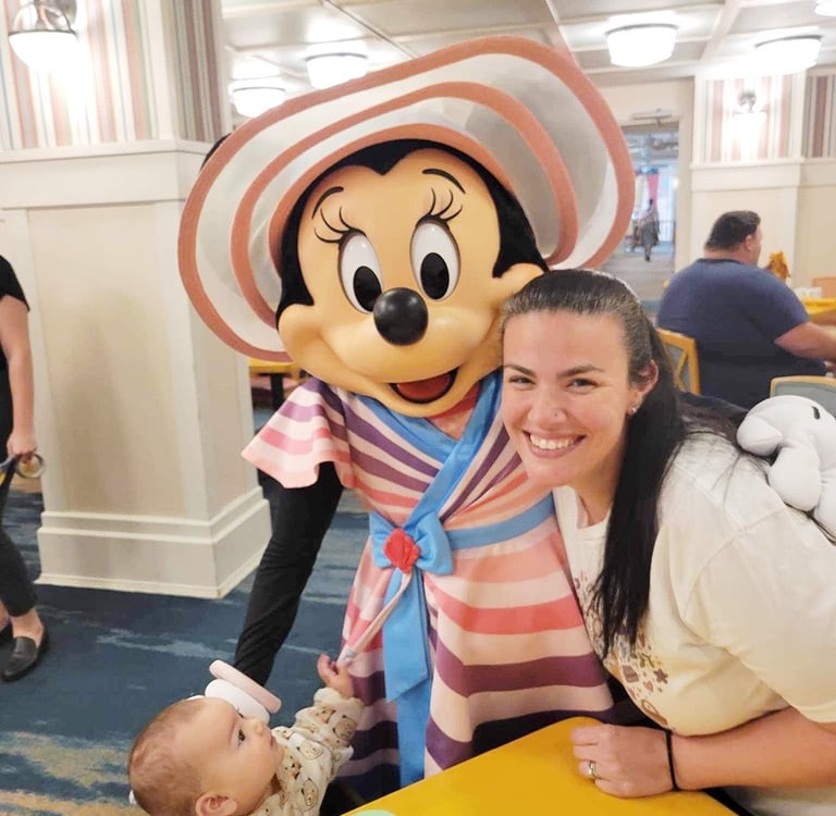 Sarah Rengulbai pictured with Minnie Mouse at Walt Disney World® Resort.