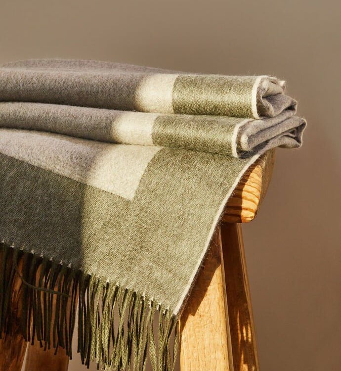 Cashmere blankets, quiet luxury and quality.
