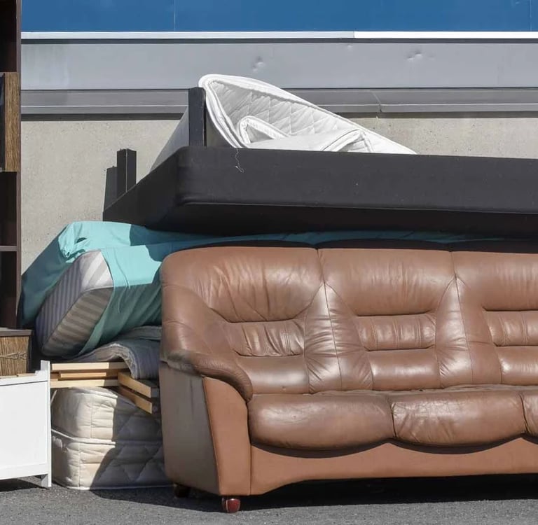 Old Sofa and Mattresses in Trash
