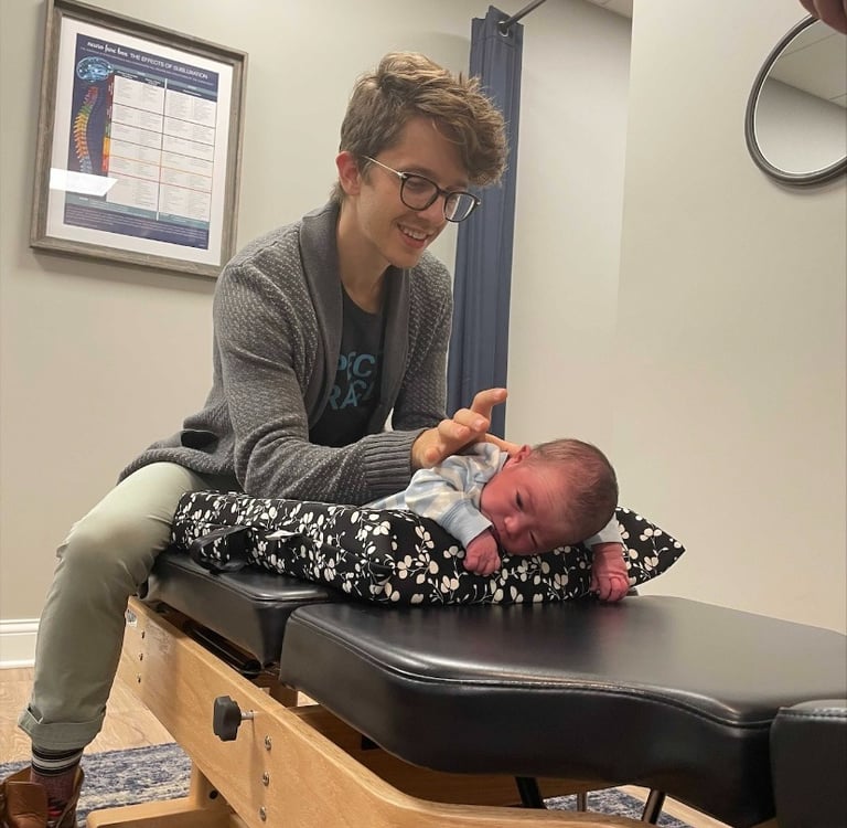Calm baby peacefully sleeping during their chiropractic adjustment in Franklin, TN