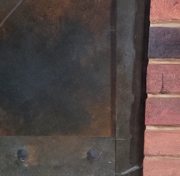 Détail d'un décor peint en trompe-l'oeil, imitation de métal rouillé et mur de briques