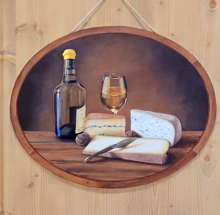 Médaillon peint en trompe-l'oeil sur une porte en bois. Il représente le terroir du Jura: vin Jaune.